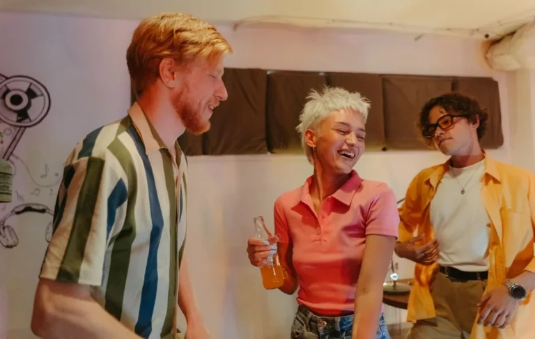 Friends laughing together at a party